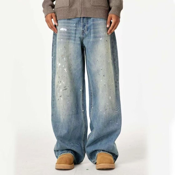 New American High Street Men's Flare Jeans, Vintage Washed with Artistic Splatter Print, Loose-Fitting Floor-Dragging Trousers for Men.